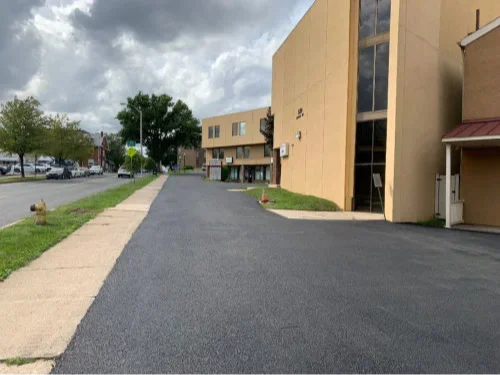 Comparison of asphalt and concrete paving in a retail parking lot in Alburtis & Lehigh Valley, PA